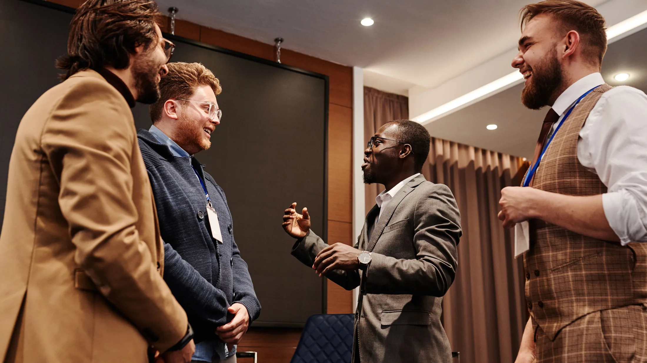 Delegates talking between sessions at a conference